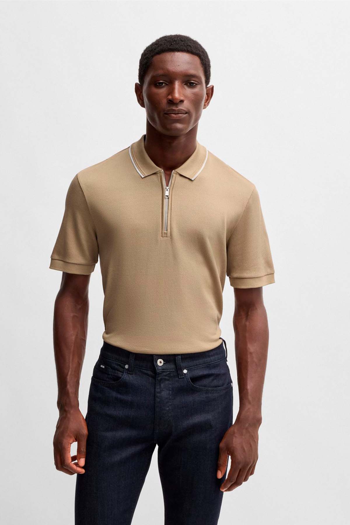 Polo de algodón estructurado con tapeta de cremallera